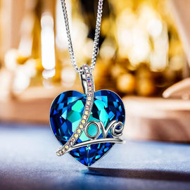 Bermuda Blue Heart Shaped Elements Lining Necklace in 14K White Gold Plating