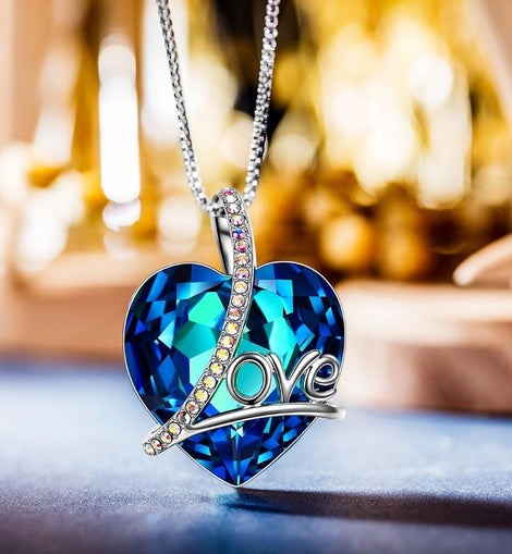 Bermuda Blue Heart Shaped Elements Lining Necklace in 14K White Gold Plating