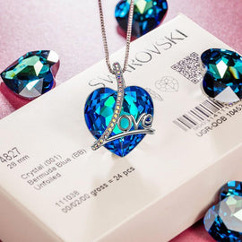 Bermuda Blue Heart Shaped Elements Lining Necklace in 14K White Gold Plating